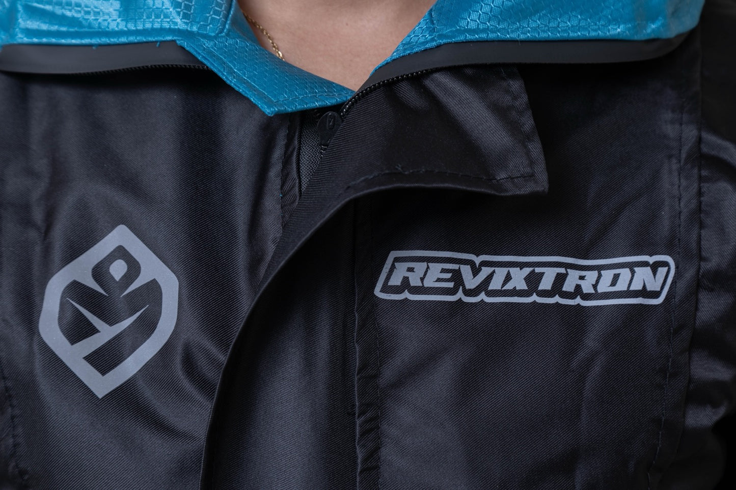 Chaqueta doble faz impermeable turquesa