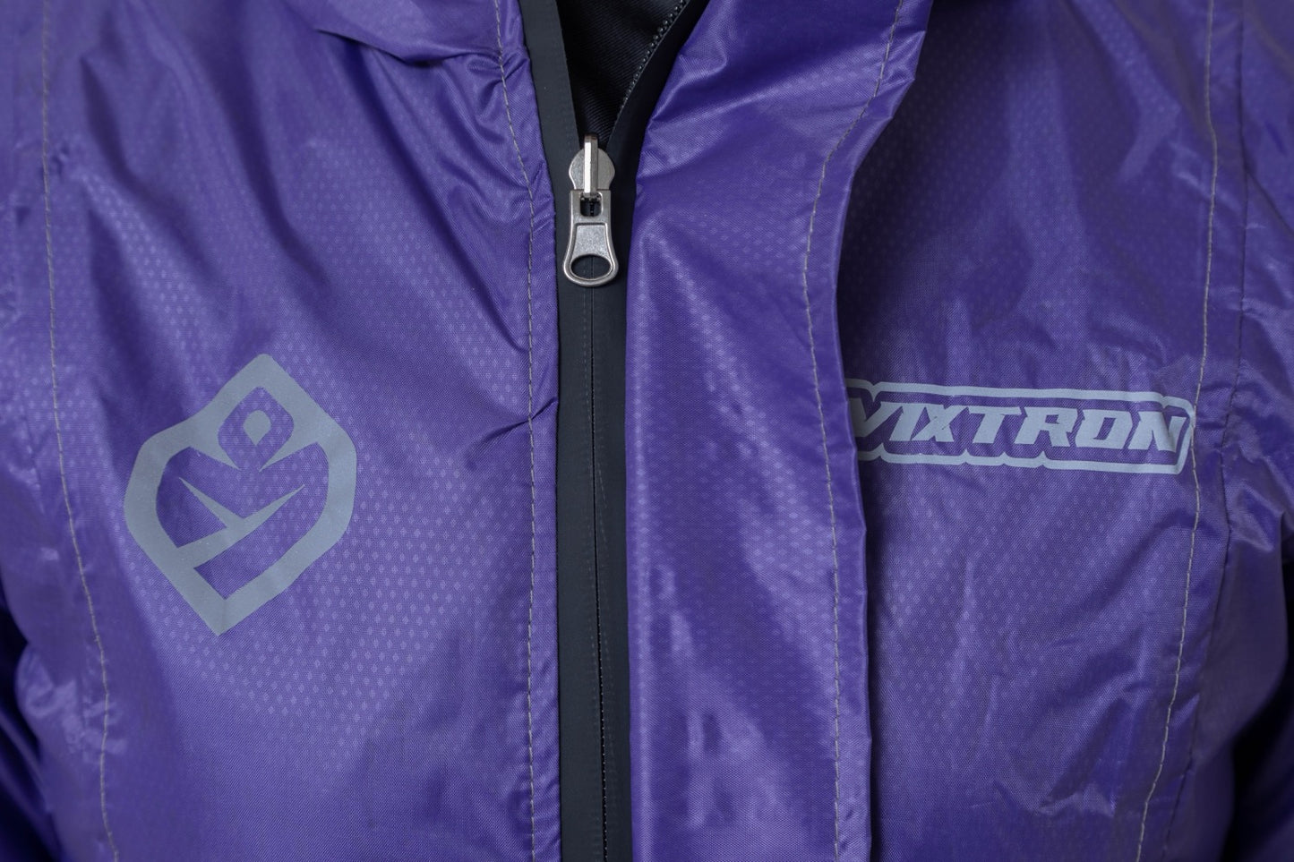 Chaqueta doble faz impermeable morada